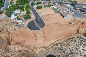 Aerial overview of property's location featuring nearby suburban area