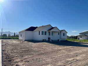 View of front of property with a mountain view