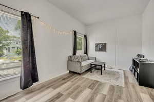 Living area featuring light wood-style floors