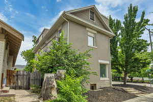 View of side of home with brick siding