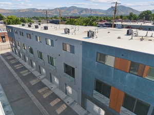 View of building exterior featuring a mountain view