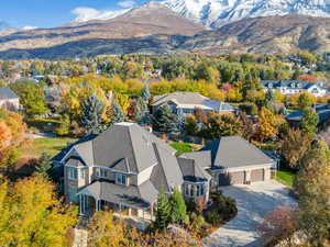 View of subject property with a mountain backdrop