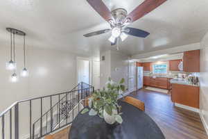 Dining area is just off of the kitchen with plenty of room in between