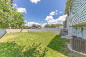 View of fully fenced backyard
