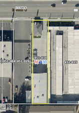 Aerial map of property and surrounding area with property parcel outlined