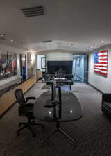 Recreation room with carpet flooring, recessed lighting, and an office area