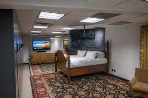 Bedroom featuring a drop ceiling