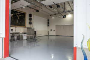 Garage featuring stainless steel built in fridge