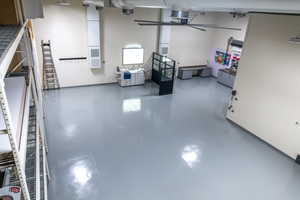 Below grade area featuring a ceiling fan