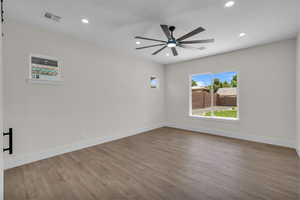 Spare room featuring recessed lighting, wood finished floors, and ceiling fan