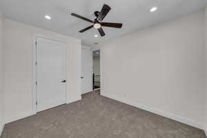 Unfurnished bedroom featuring carpet flooring, recessed lighting, and ceiling fan
