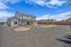 Back of house with stucco siding