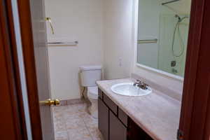 Full bath featuring vanity and shower / tub combination