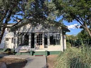 Front of property with entry steps