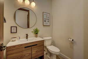 Bathroom featuring toilet and vanity
