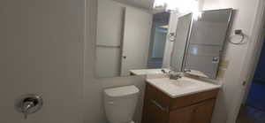 Bathroom with vanity and toilet