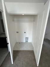 Five plex Laundry area with electric dryer hookup, washer hookup, and carpet floors