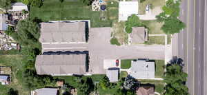 Aerial view of property's location featuring nearby suburban area