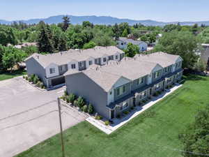Aerial view of North and South five plex' with a mountainous background