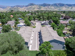 Aerial view of residential area with a mountainous background