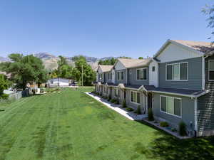 View of yard of North Five-Plex with a mountain view