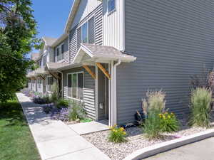 View of property South Five-Plex exterior featuring board and batten siding