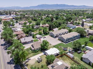 Aerial view of residential area featuring a mountain backdrop