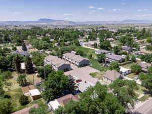 Aerial view of residential area featuring mountains