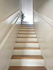 Stairway with wood finished floors