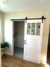 Bathroom featuring wood finished floors