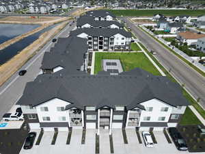 Aerial view of residential area with a nearby body of water
