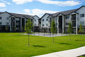 View of home's community with a lawn and a residential view