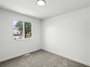2nd upstairs bedroom, new carpet paint  & windows