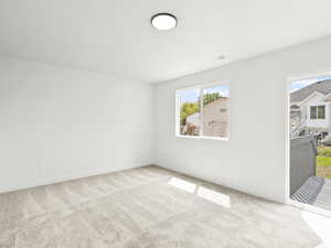 Bed, Office or 2nd Family Room with plenty of natural light and outdoor walkout to wood deck