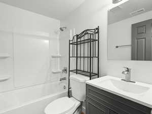 Basement Full bath featuring vanity and bathtub / shower combination