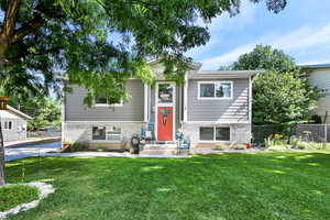 View of front of home featuring brick siding