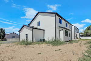View of property exterior with stucco siding