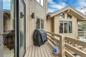 Wooden terrace with area for grilling