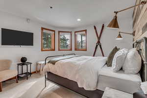 Carpeted bedroom featuring baseboards and recessed lighting