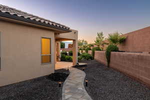 Fenced backyard featuring a patio area