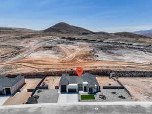 View from above of property with a mountainous background