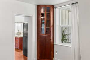 featuring wood finished floors and baseboards