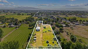 Aerial view of property's location with mountains and property parcel outlined