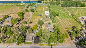 Aerial overview of property's location with farmland and rural landscape