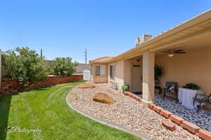 View of yard with a ceiling fan
