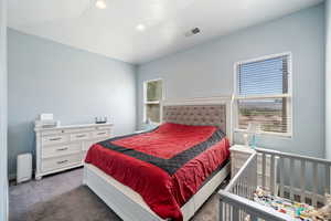 Bedroom featuring carpet and recessed lighting