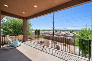 Patio / terrace featuring a mountain view and a residential view
