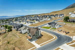 Aerial perspective of suburban area with mountains