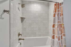 Full bathroom featuring shower / tub combo
