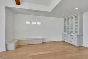Unfurnished dining area with recessed lighting and light wood-style floors